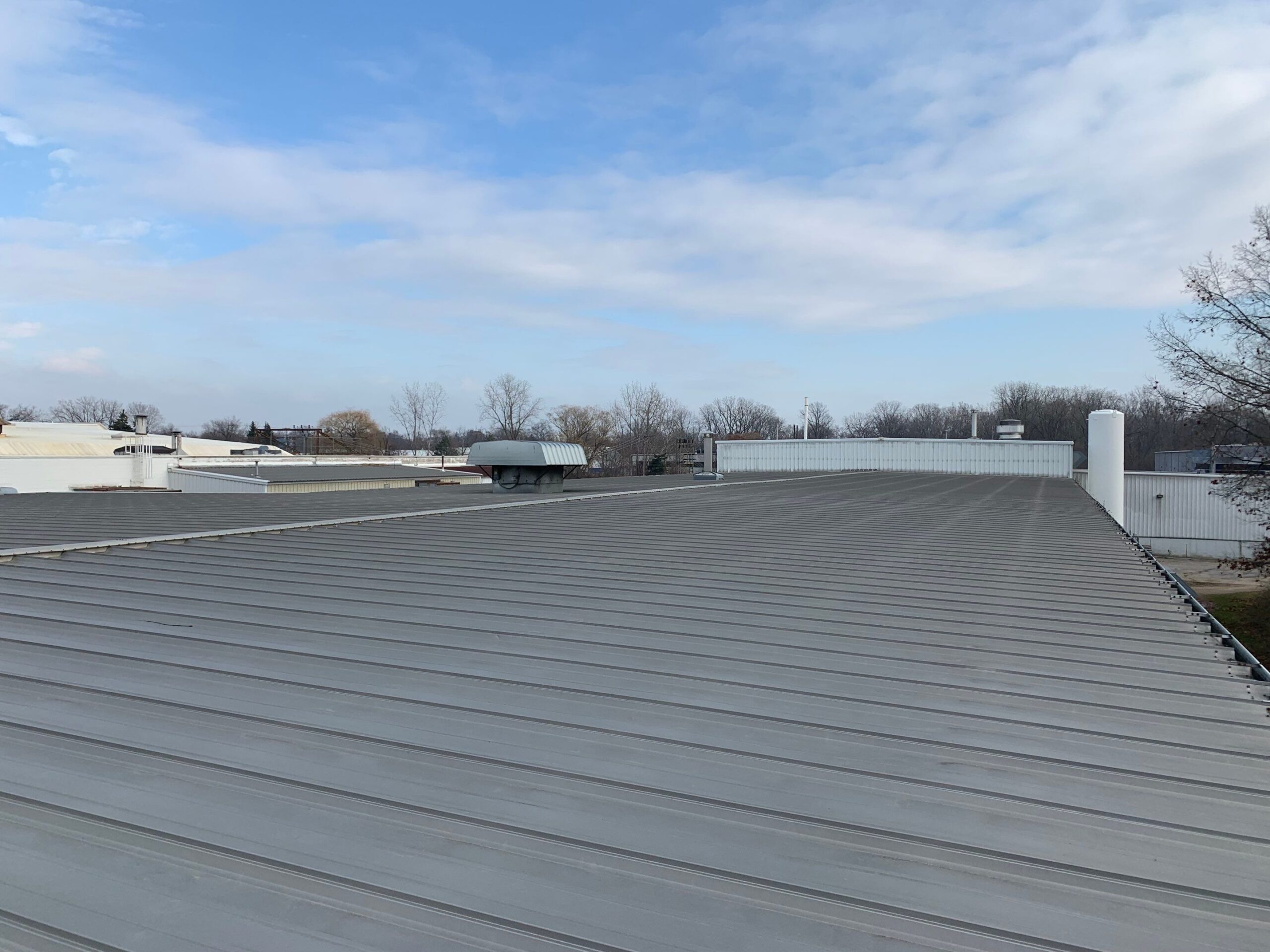 Commercial roof recycle in place