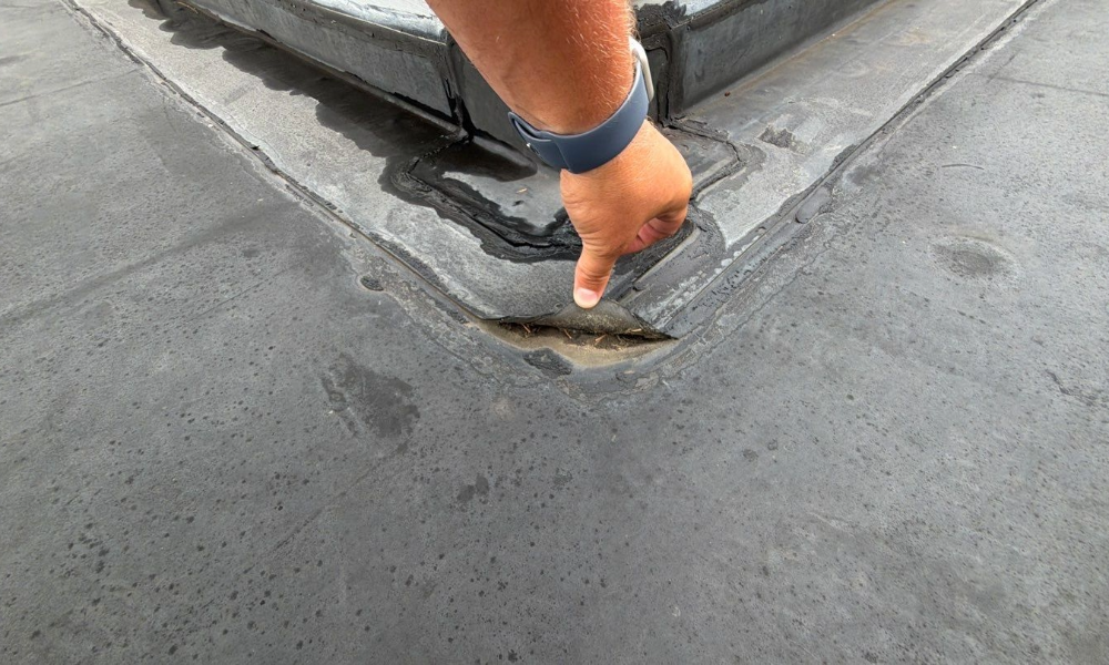 Failing edge seam on commercial roof