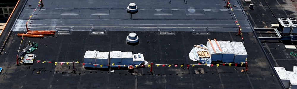 Roofing Repair for School Buildings: What Should You Look for When Evaluating a Flat Roof?